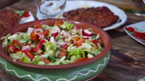 Woman Spoon Puts Vegetable Salad Plate Close — Stock Video