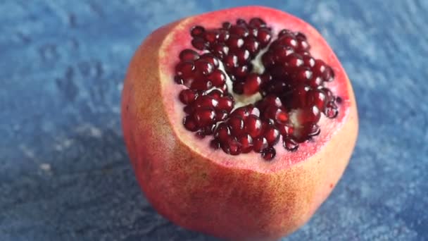 Pomegranate Rotation Blue Stone Background — Stock Video