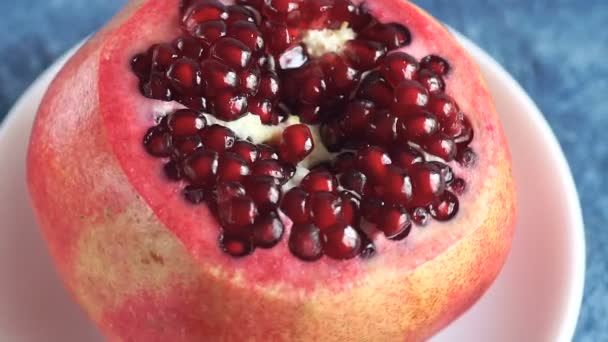 Pomegranate Rotation Blue Stone Background — Stock Video