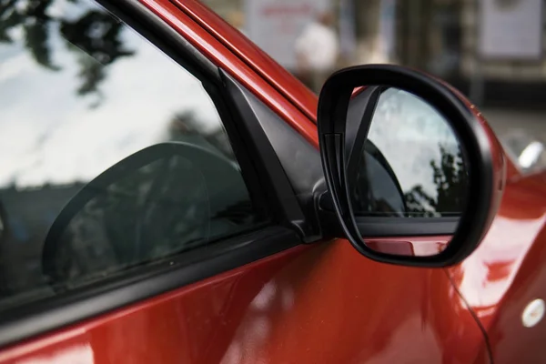 Side mirror of modern car, closeup