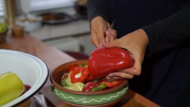 Young Woman Slicing Sweet Red Yellow Pepper Wooden Cutting Board — Stock Video