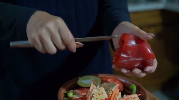 Young Woman Slicing Sweet Red Yellow Pepper Wooden Cutting Board — Stock Video