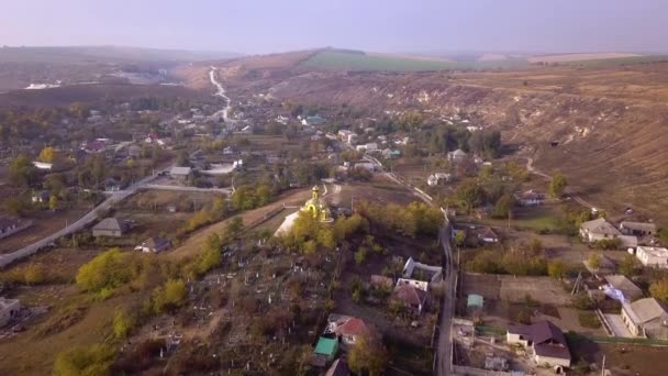 Camera flight over small village — Stock Video