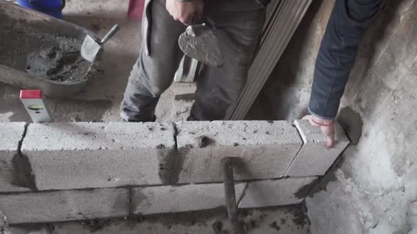 Construction Worker Builds Brick Wall Closeup View Construction Site — Stock Video