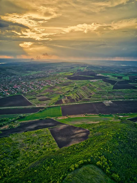 Flight over cultivating field in the spring at sunset. Moldova Republic of. — Stock Photo, Image