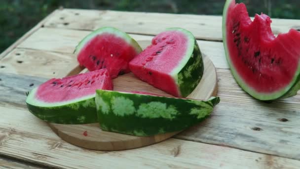 Fresh Sliced Watermelon Wooden Background Garden — Stock Video
