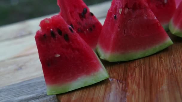 Fresh Sliced Watermelon Wooden Background Garden — Stock Video