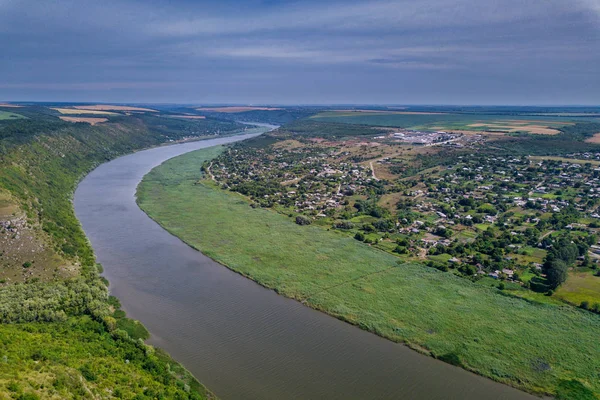 Arial view over the river and small village. Dniester river. — Stock Photo, Image