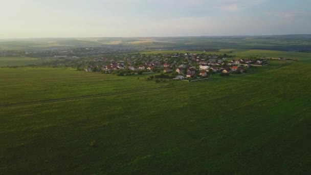 Flying Green Countryside Hills Village Houses Farmland Spring Aerial Drone — Stock Video