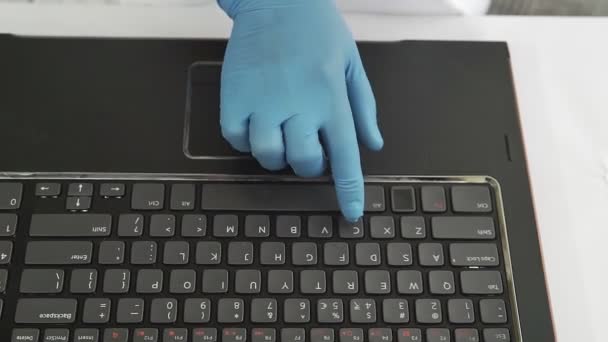 Closeup Unrecognizable Medic Blue Protective Gloves Remote Work Laptop — Stockvideo