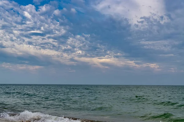 Relaxing seascape with wide horizon of the sky and the sea