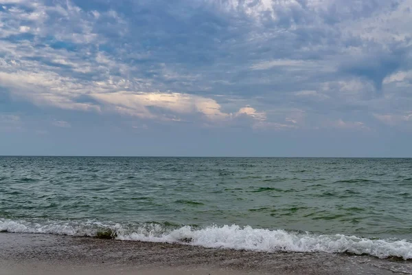 Relaxing seascape with wide horizon of the sky and the sea