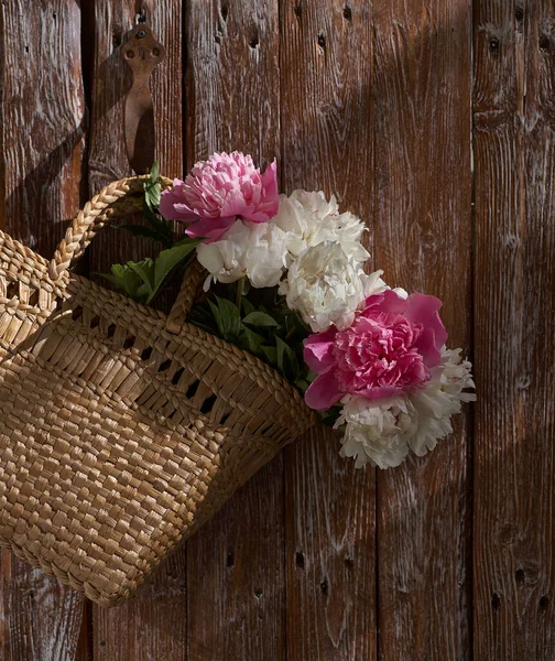 Flowers Pink Red White Peonies Wicker Basket Wooden Table Wooden — Stock Photo, Image