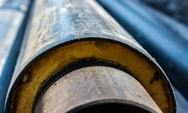 steel pipe covered with rubber isolation on street