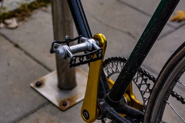 Part of the bike, pedal bike standing in the parking lot — Stock Photo, Image