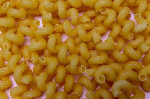 Textura de macarrão espiral de perto. alimentos — Fotografia de Stock