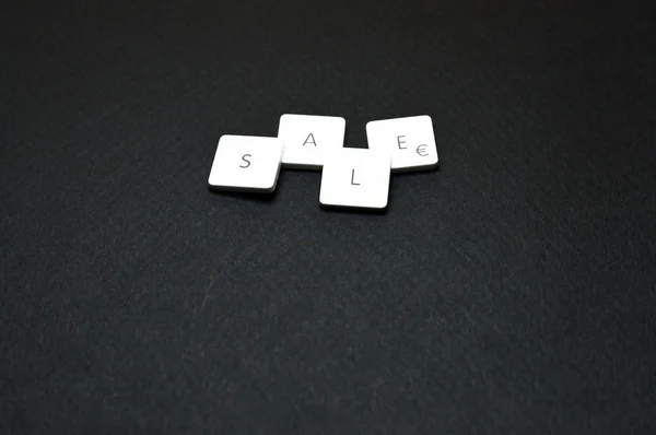 Plastic keyboard keys showing messages and commands, ideal for your tech projects or computer publications.