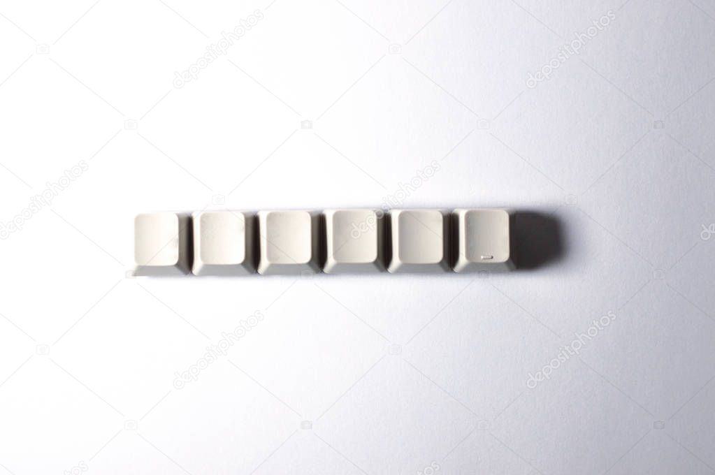 Plastic keyboard keys showing messages and commands, ideal for your tech projects or computer publications.