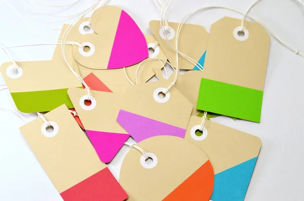 Paper tag on white background, ideal for your shopping projects or business topics.