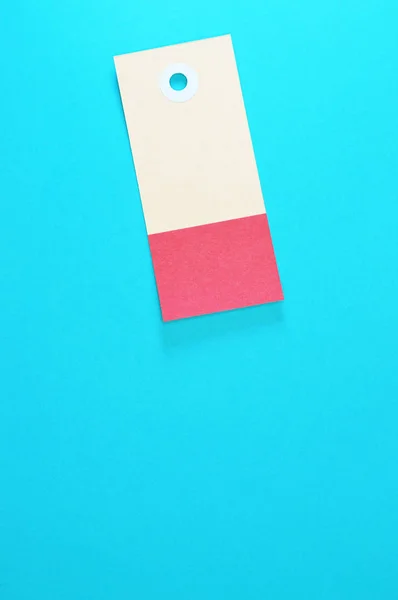 rectangle paper tag on blue background vertical template