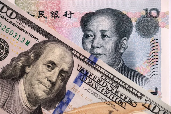 US dollar and chinese yuan. Concept for trade war or trading between China and the USA