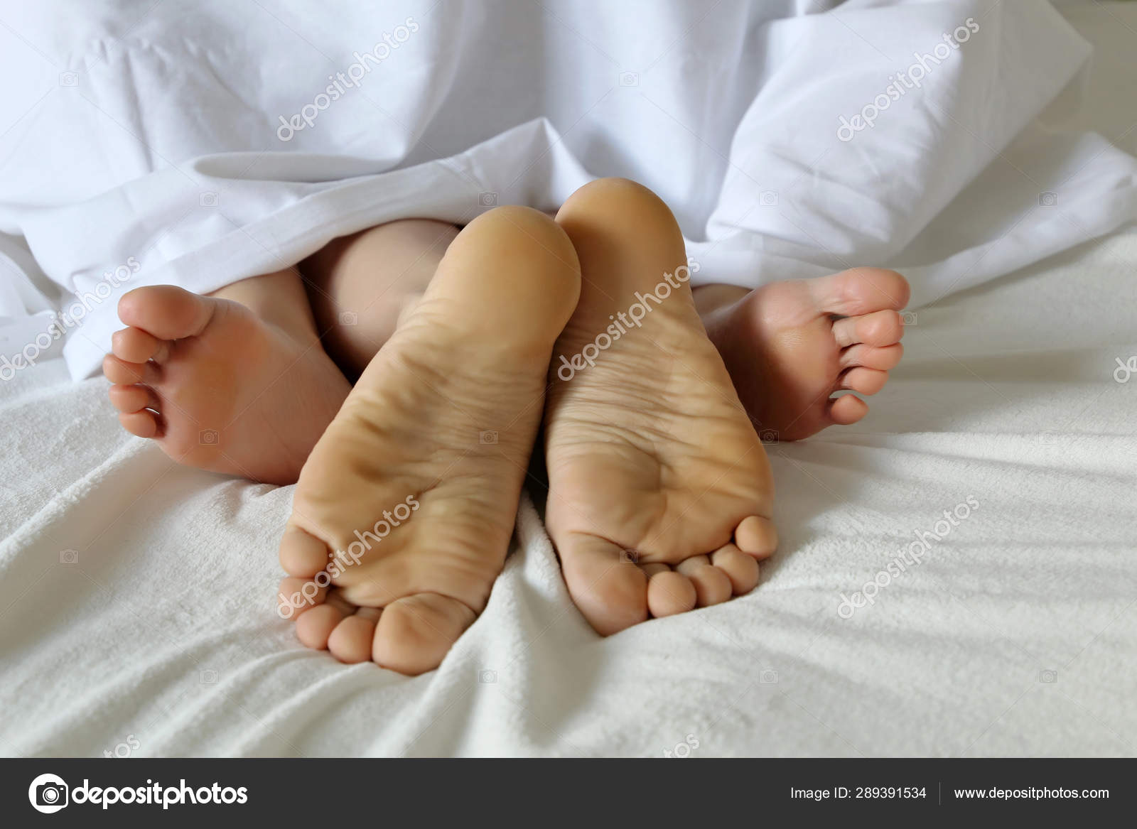 Couple Having Sex Bed Naked Male Female Feet White Blanket Stock Photo by ©olegpmr 289391534 picture