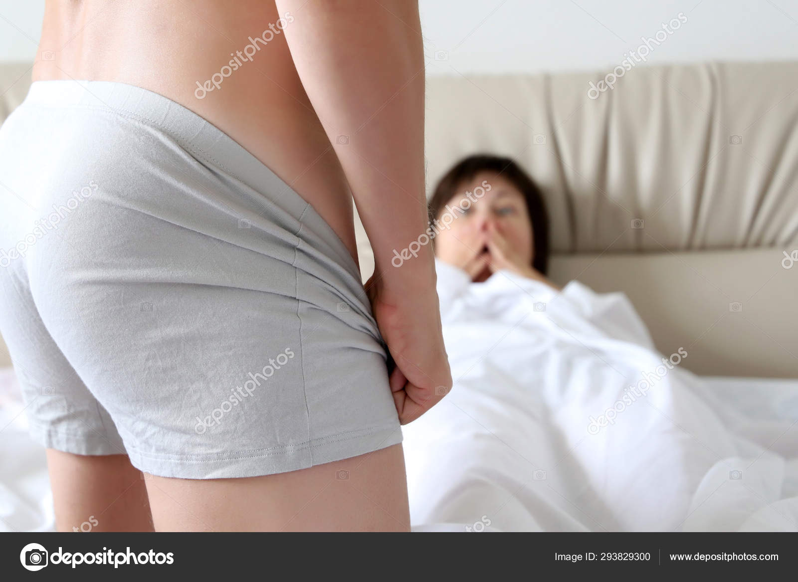 Surprised Woman Looking Man His Underpants Couple Lovers Bed Concept Stock Photo by ©olegpmr 293829300