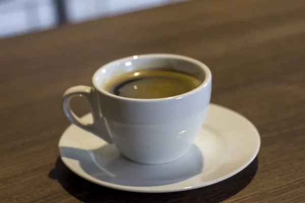 Egy Csésze Kávé Egy Asztalon — Stock Fotó