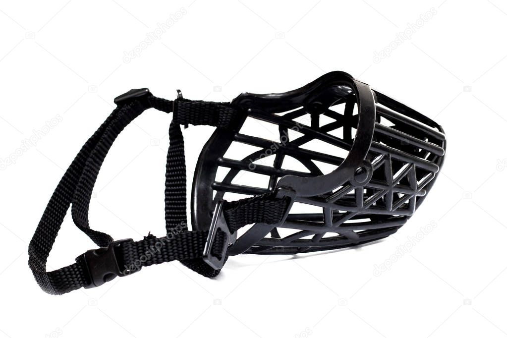 Black plastic muzzle for a dog on a white background