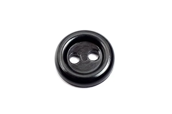 Ένα Μαύρο Πλαστικό Κουμπί Απομονωθεί Λευκό Φόντο Εσωτερικη — Φωτογραφία Αρχείου