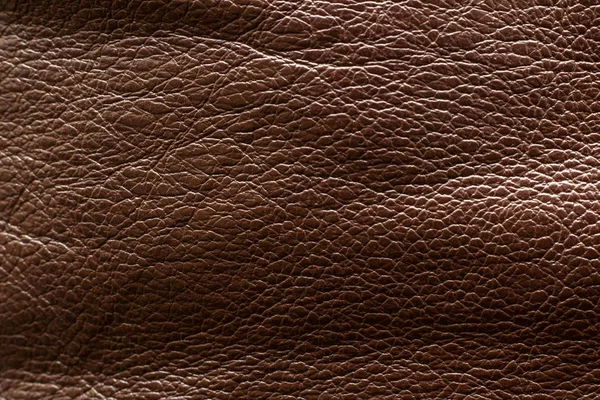 Skrynkliga brunt läder nära upp, textur eller bakgrund — Stockfoto