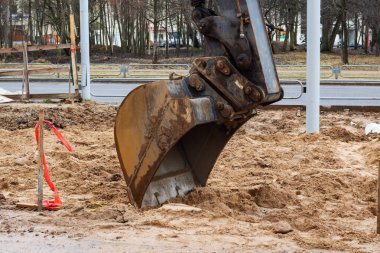 Ekskavatör Kepçe yakın çekim bir şantiye
