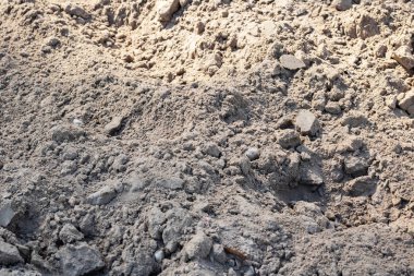 Gri kum yığını yakın çekim, arka plan veya doku