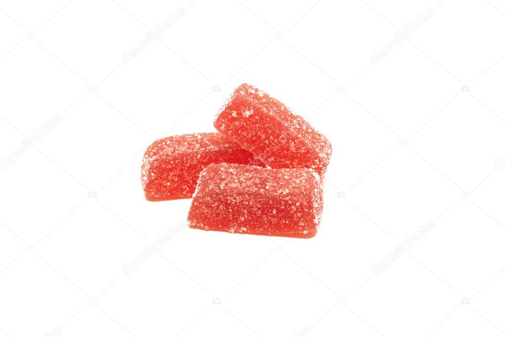 Three marmalade candies close up, isolated on white