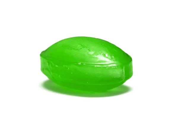 Piruleta de caramelo verde, aislado sobre fondo blanco —  Fotos de Stock