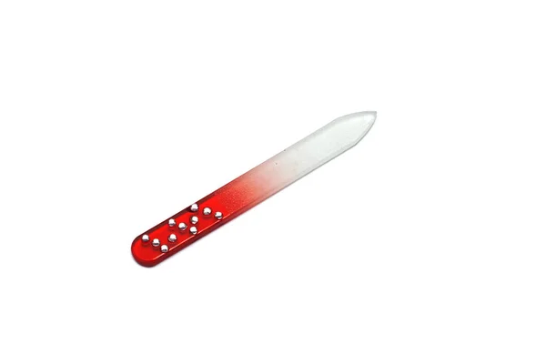 Red glass nail file, isolated on a white background — Stock Photo, Image
