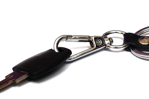 Key and black keychain, isolated on white background — Stock Photo, Image