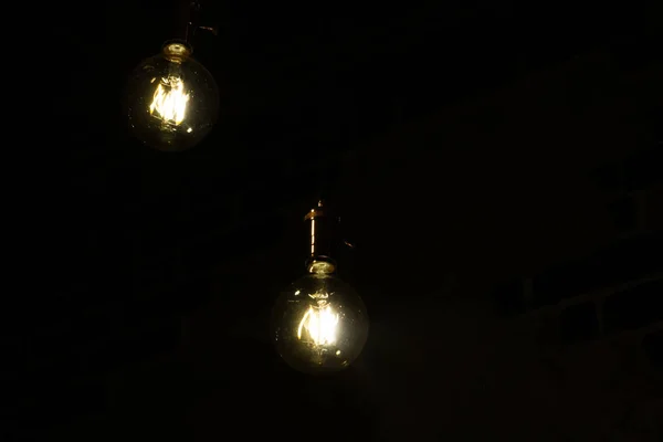 Yellow light bulbs in retro style close up — Stockfoto