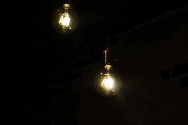 Yellow light bulbs in retro style close up — 스톡 사진