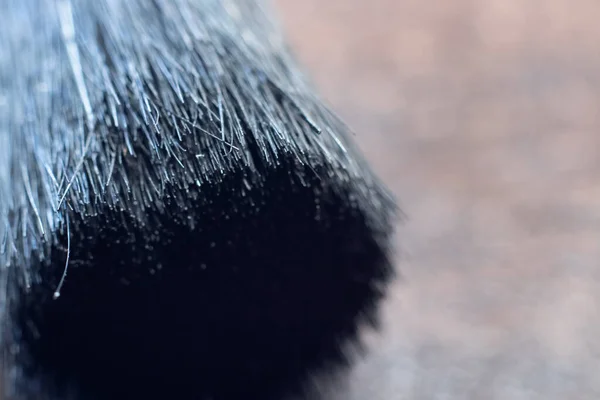 Черная куча кистей макияжа макро фото крупным планом — стоковое фото