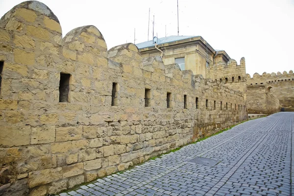 The fortress gates of the old city in the illumination . Icheri Sheher in Baku. Azerbaijan . Gate of the old fortress, entrance to Baku old town. Baku, Azerbaijan. Walls of the Old City in Baku . Icheri Sheher is a UNESCO World Heritage Site