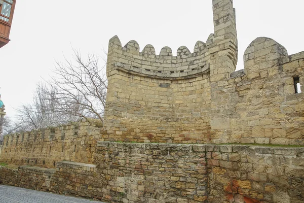 The fortress gates of the old city in the illumination . Icheri Sheher in Baku. Azerbaijan . Gate of the old fortress, entrance to Baku old town. Baku, Azerbaijan. Walls of the Old City in Baku . Icheri Sheher is a UNESCO World Heritage Site