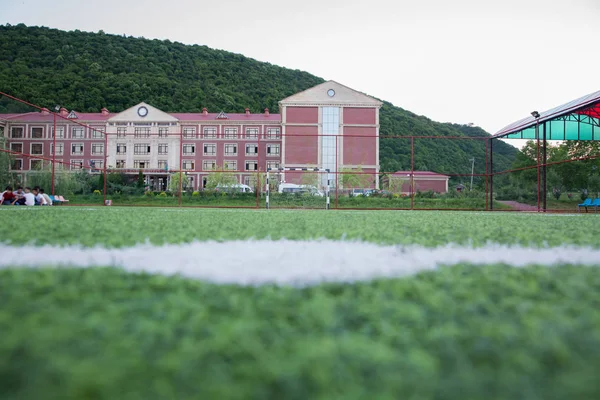 체육관 스포츠 분야에서에서에 Defocused 축구장의 코너입니다 잔디에 — 스톡 사진