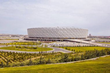 Bir 650.000 metrekare sitesinde 225.000 metrekare stadyumun inşaat Şubat 2015 yılında tamamlandı. Altı katlı 65,7 metre yapısı yakın Boyukshor göl, Bakü, Azerbaycan