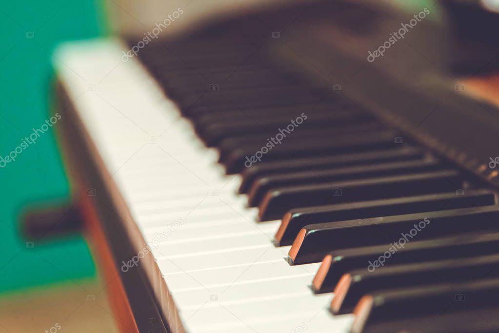 Electronic synthesizer piano keyboard isolated on white background with clipping path