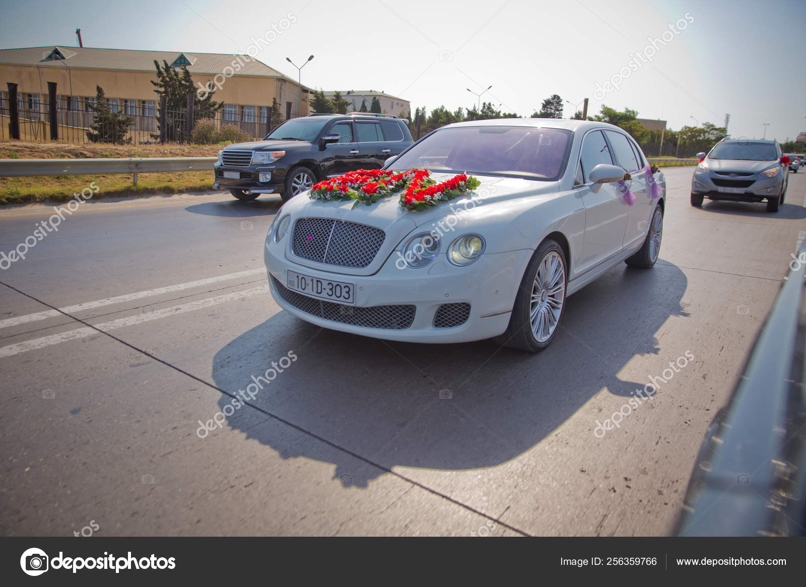 Closeup Image Of Wedding Car Decoration With Red And White