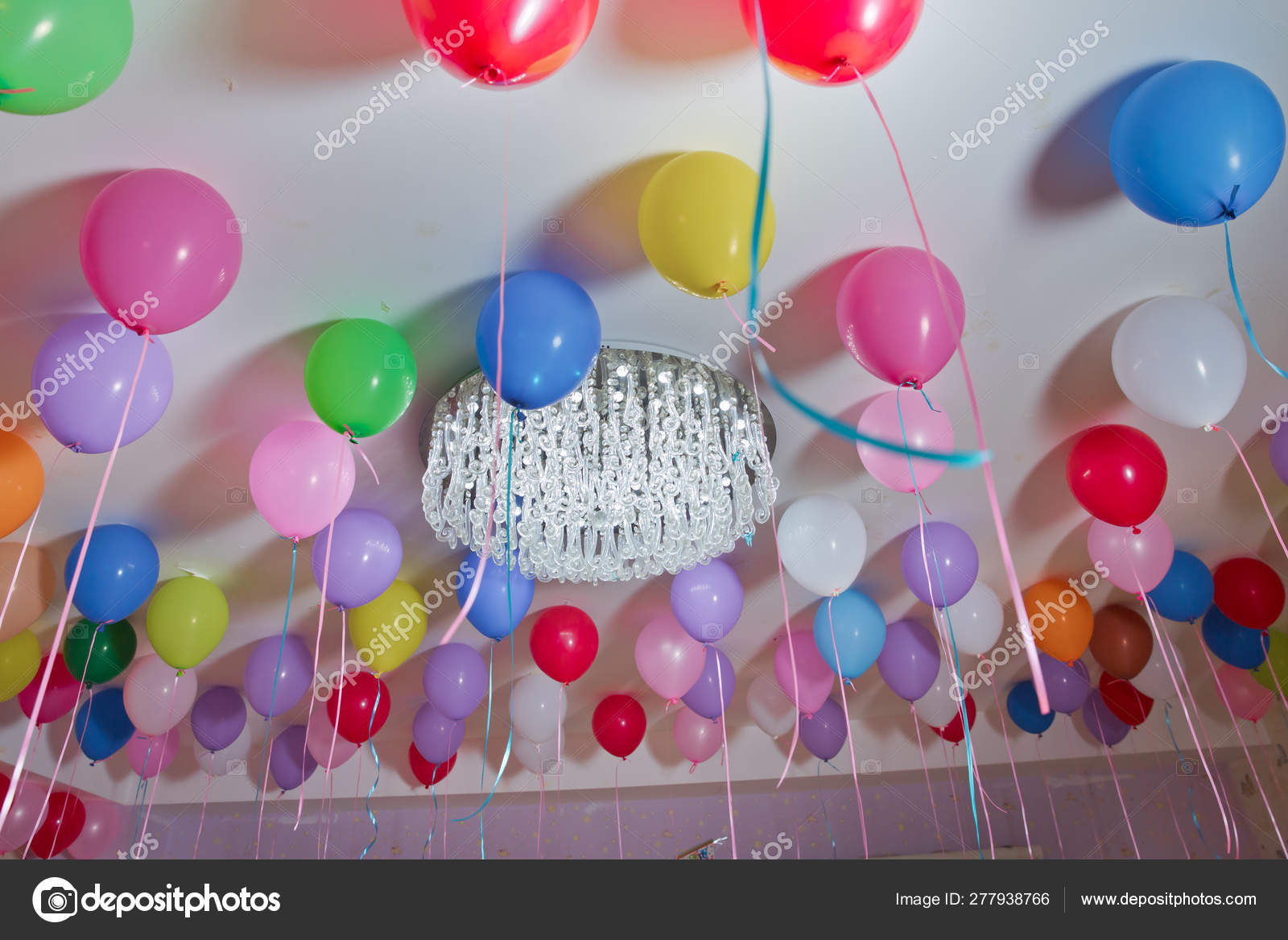 Colorfull Balloons Float On The White Ceiling In The Room