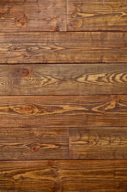 Ahşap Malzeme Arka Plan Duvar Kağıdı Doku Kavramı . Sıcak renklerde eski kahverengi tahta. Koyu eski ahşap masa dokusu arka plan üst görünüm . dikey ahşap arka plan .