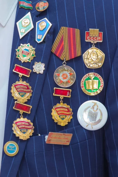 Medals and Gold Star Medal of Hero of the Soviet Union . Patriotic holiday in honor of the anniversary of the end of the war, veterans are congratulated, USSR and Russia veteran soldier medals of war