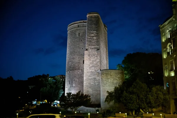 Maiden Tower at night in the Baku Old City. Azerbaijan\'s most distinctive national emblems.The Maiden Tower at night.